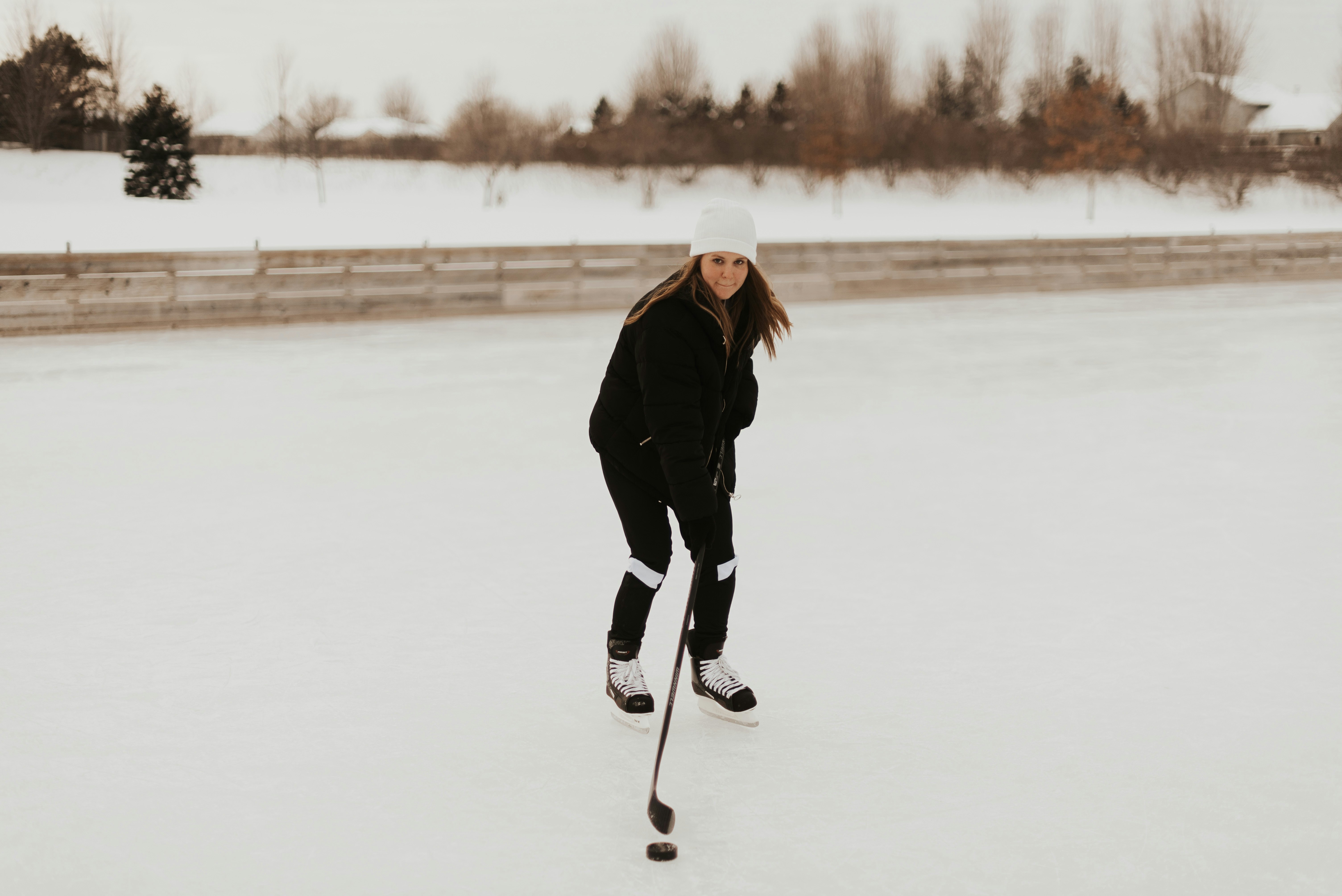 woman playing hockey